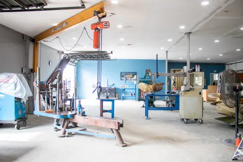 Overhead crane and work benches at the Mrs G Propeller shop